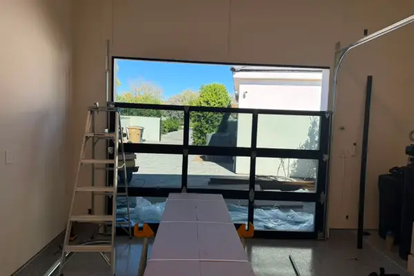 Full view glass garage door on a desert home