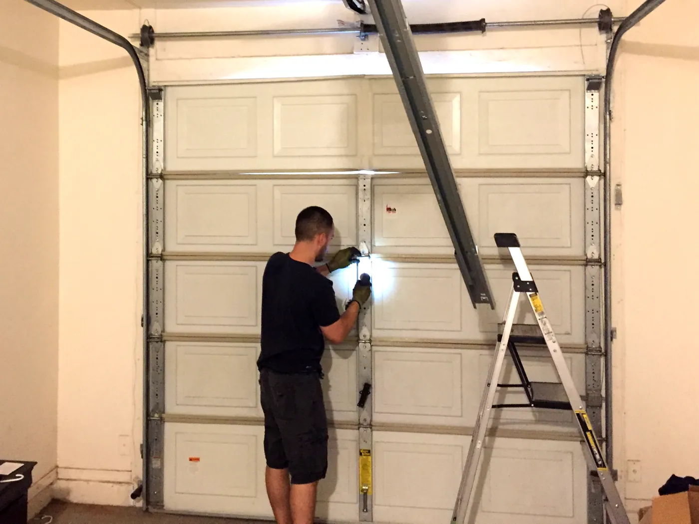 Above All Garage Door Service technician at work in the Phoenix Valley
