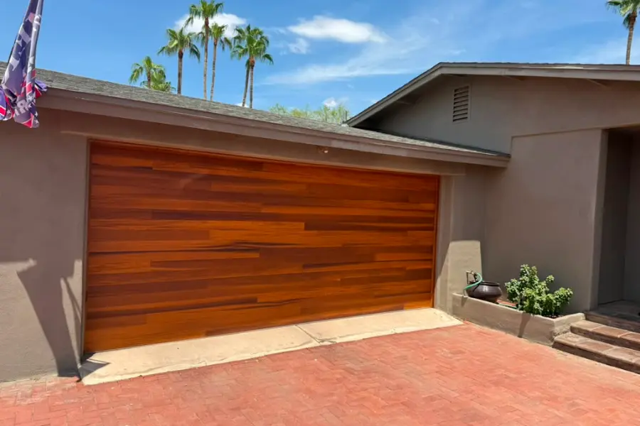A newly installed garage door on a West Valley home