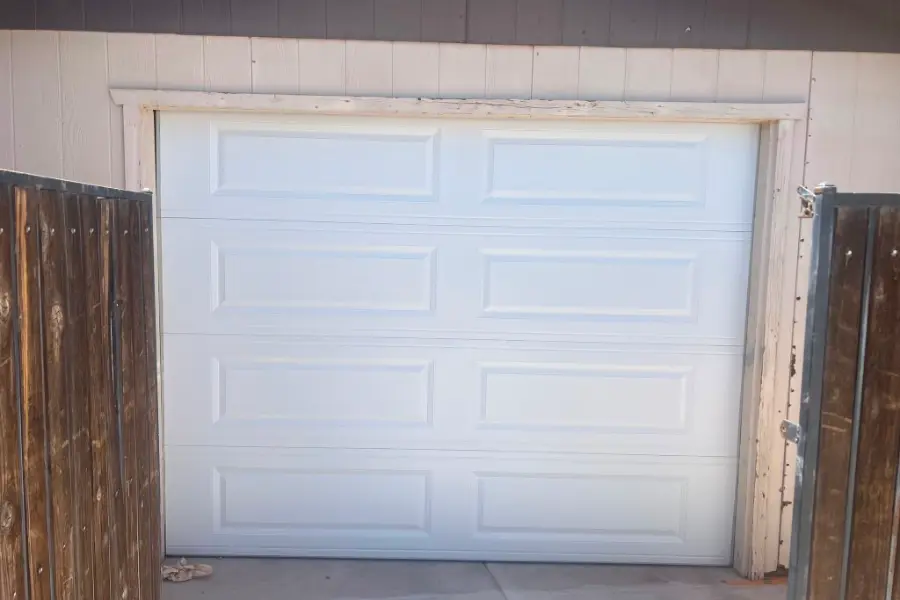 Single-car garage door in the Phoenix Valley after a repair visit