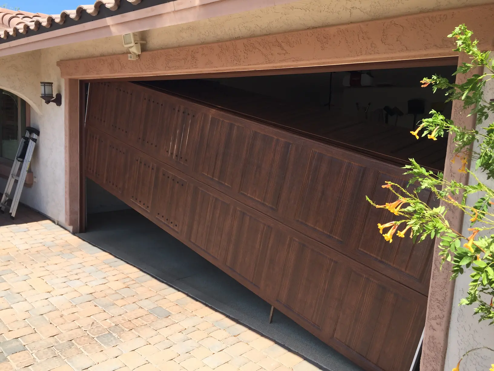 Garage Door Off Track Repair in the Phoenix Valley by Above All Garage Door Service